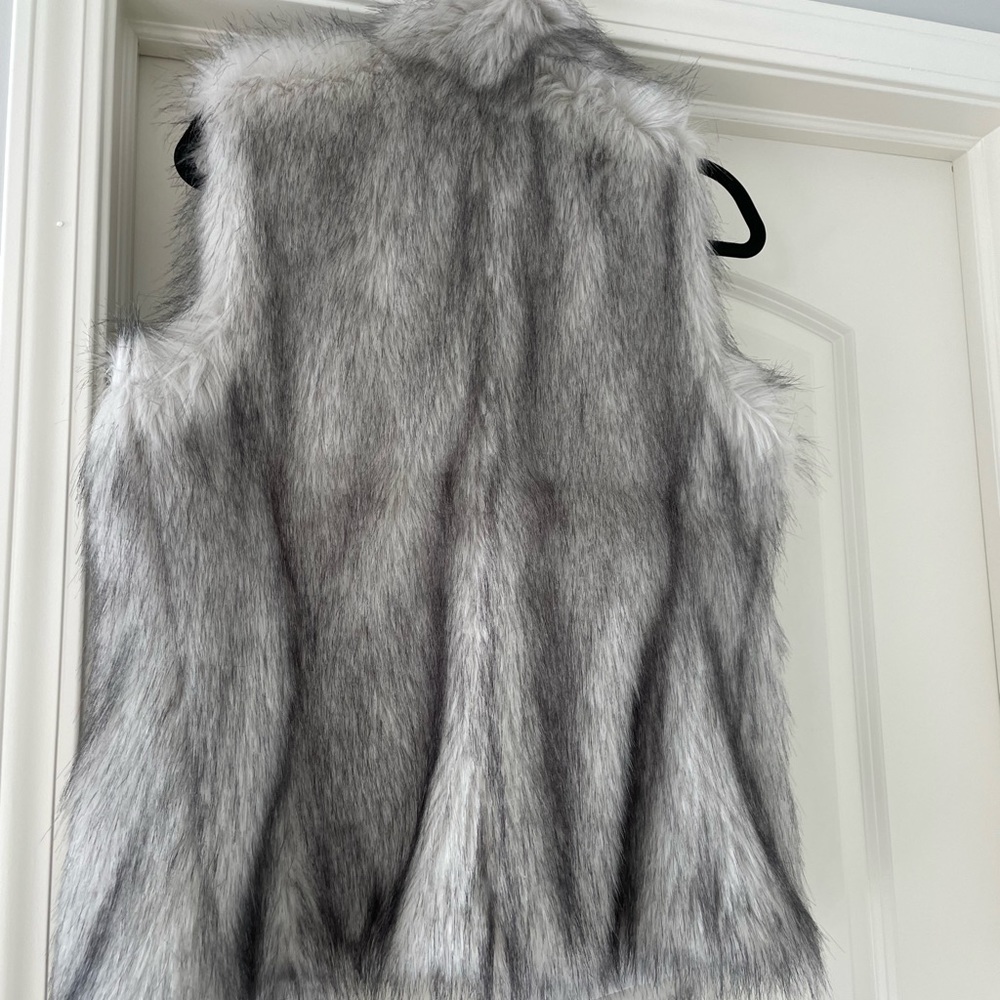 Faux fur vest- only worn once. Excellent condition.